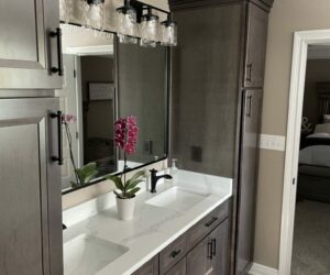 Side of Bathroom Double Sink with Mirror and Cabinets